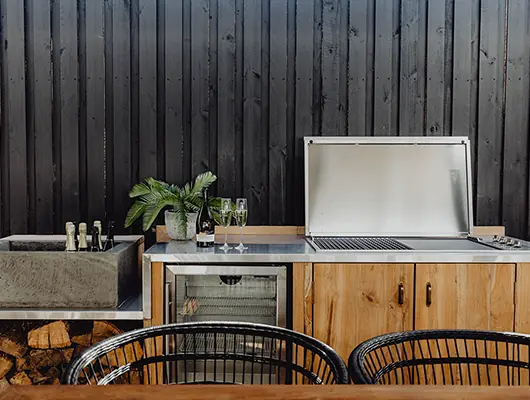 Artusi ABBQMEE3 electric BBQ installed in outdoor cabinetry.